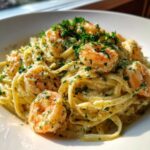 Close-up of rich Creamy Lemon Garlic Shrimp Pasta, topped with fresh parsley.